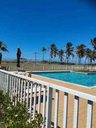 Sol & Praia Residencial – Condomínio Fechado Pé na Areia!