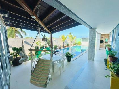 CASA NO CONDOMÍNIO PRAIA BELA