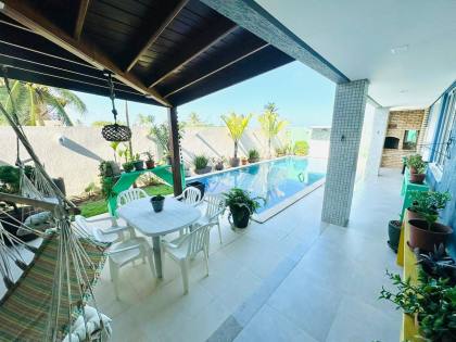CASA NO CONDOMÍNIO PRAIA BELA