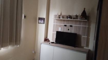 Brotas 2/4 com dependência e garagem